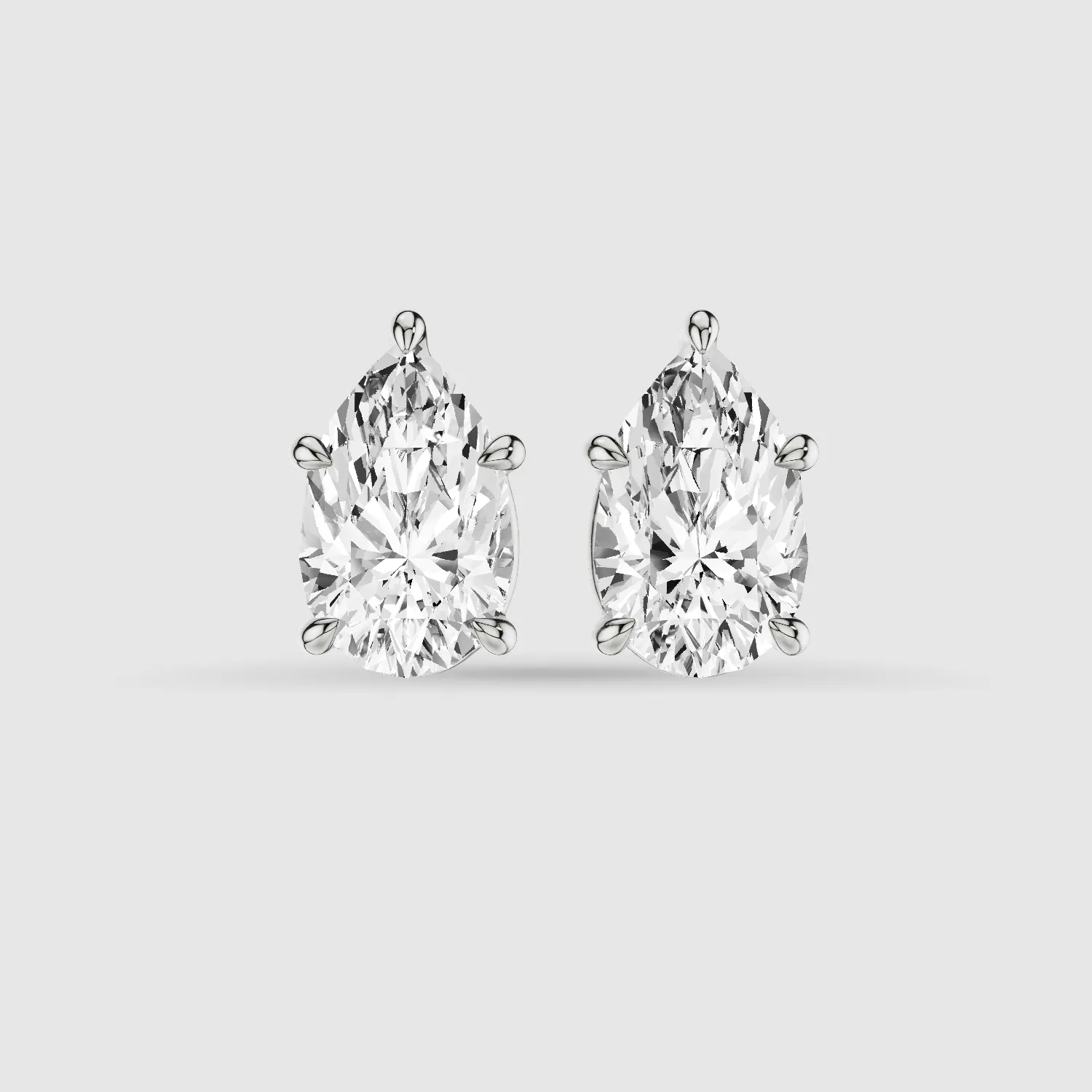 Four-Prong Solitaire Lab Grown Diamond Studs-Pear