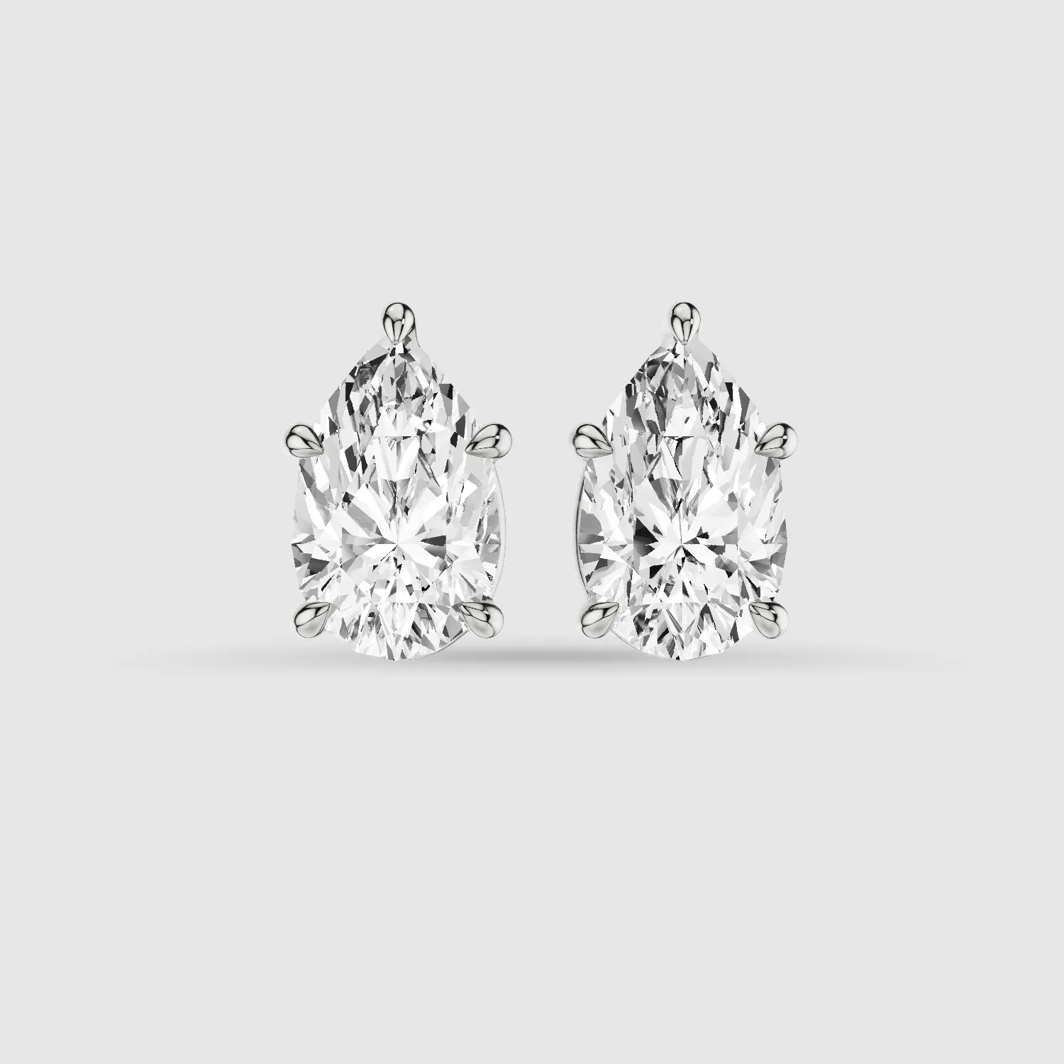 Four-Prong Solitaire Lab Grown Diamond Studs-Pear
