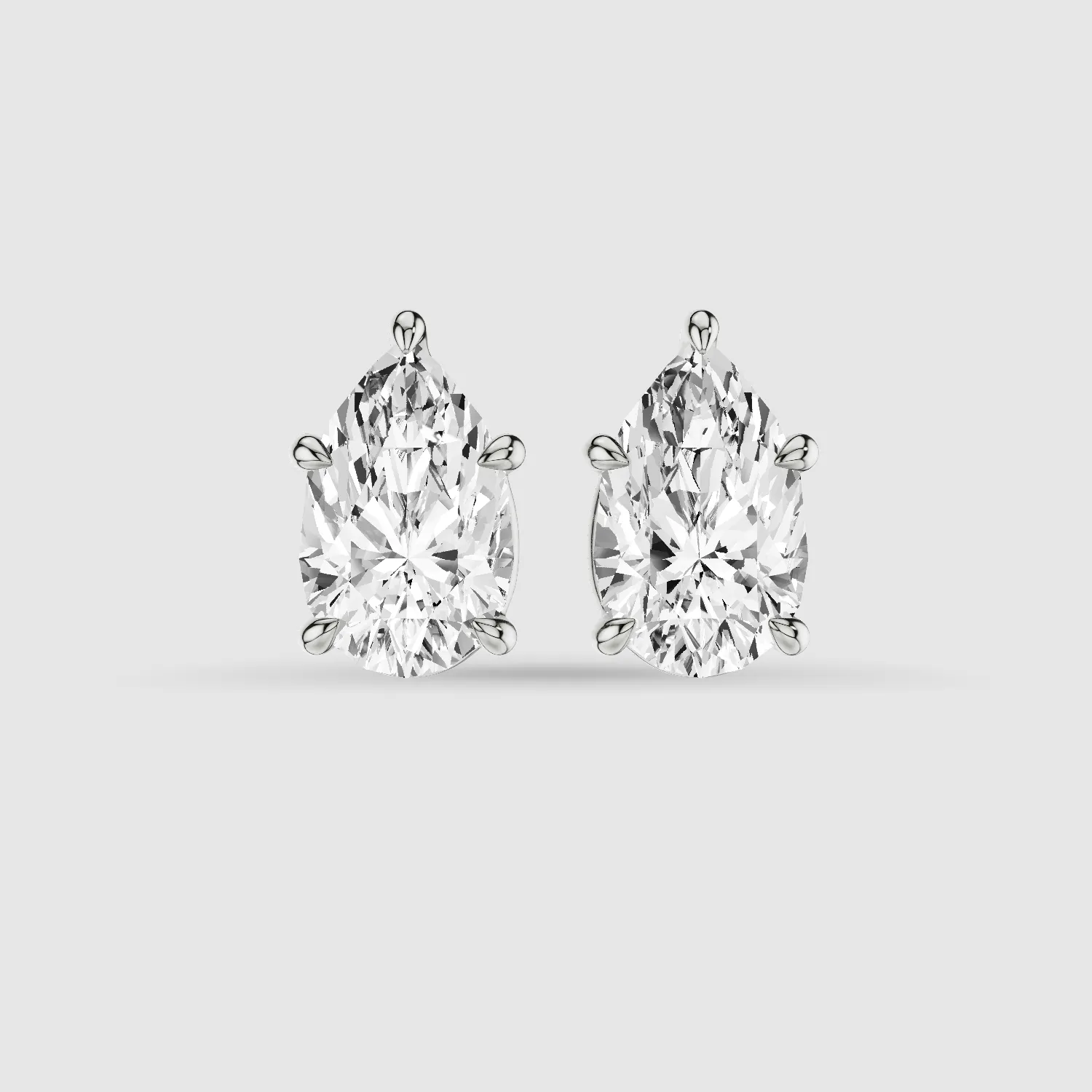 Four-Prong Solitaire Lab Grown Diamond Studs-Pear